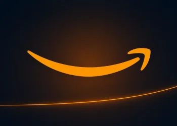 Amazon smile-arrow on a dark background illustrating the Amazon share price rally after strong AWS growth.